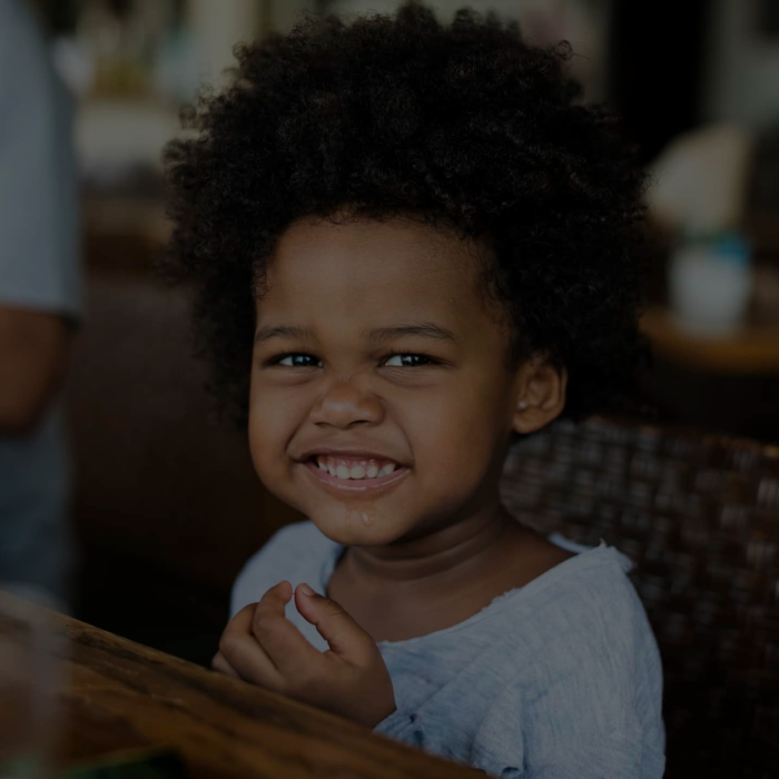 little boy at table